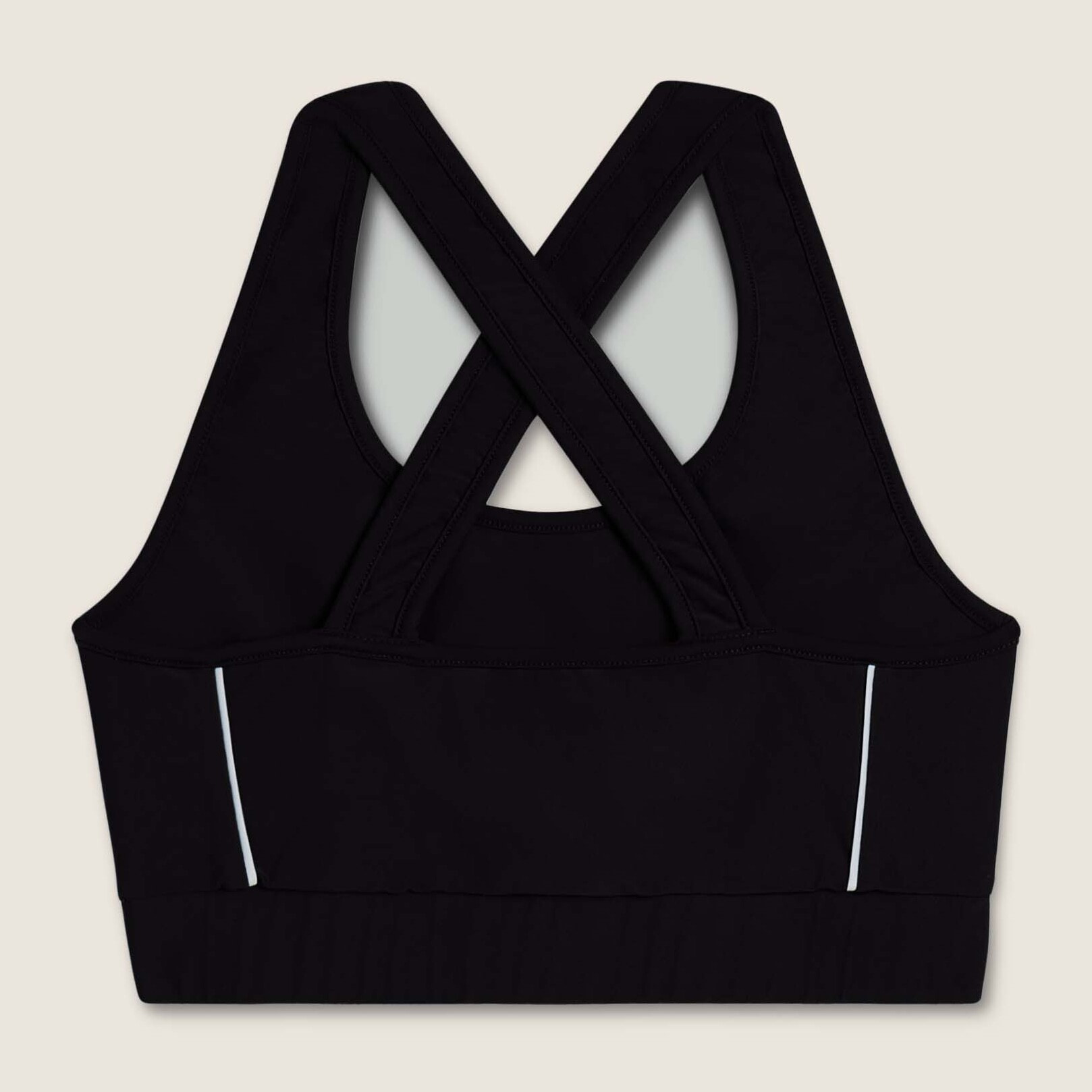 Top tecnico con spalline incrociate e profili bianchi