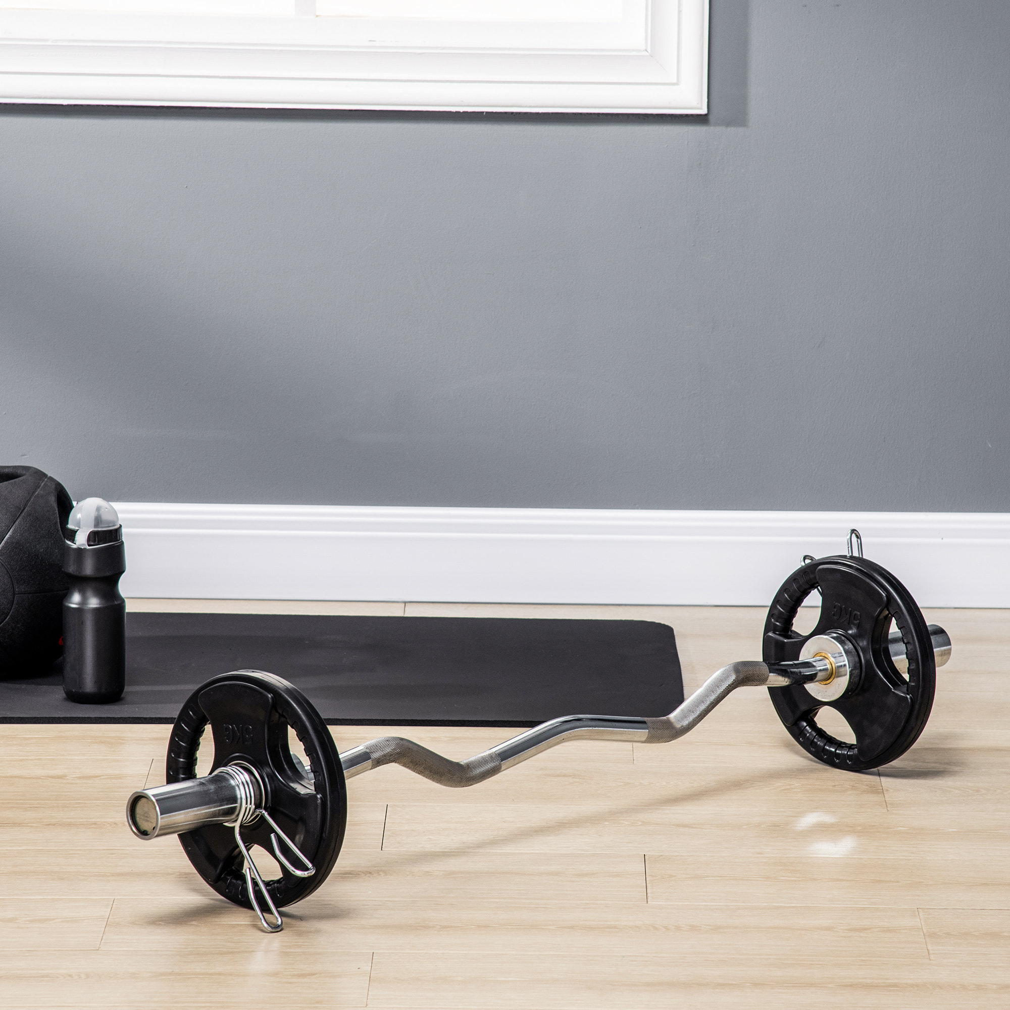 Disques de poids 2 x 5Kg - 3 poignées - trous dia.50mm - noir