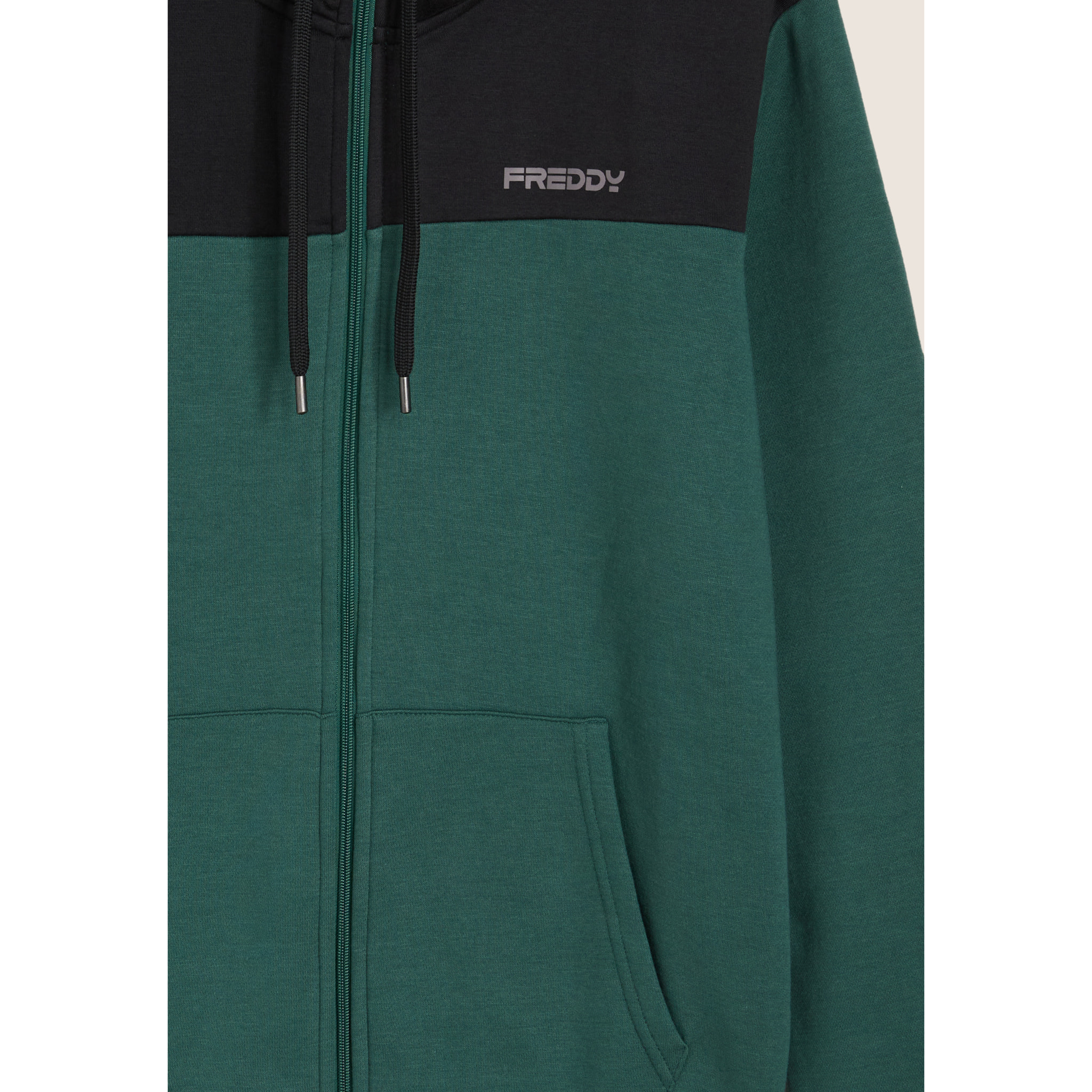 Tuta con cappuccio colour block e fondo a costine