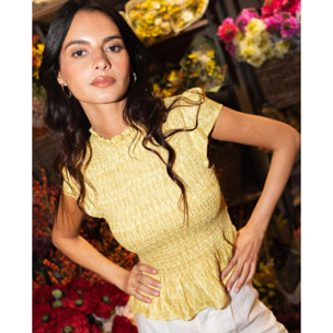 Blusa con cuerpo fruncido y volante en el bajo