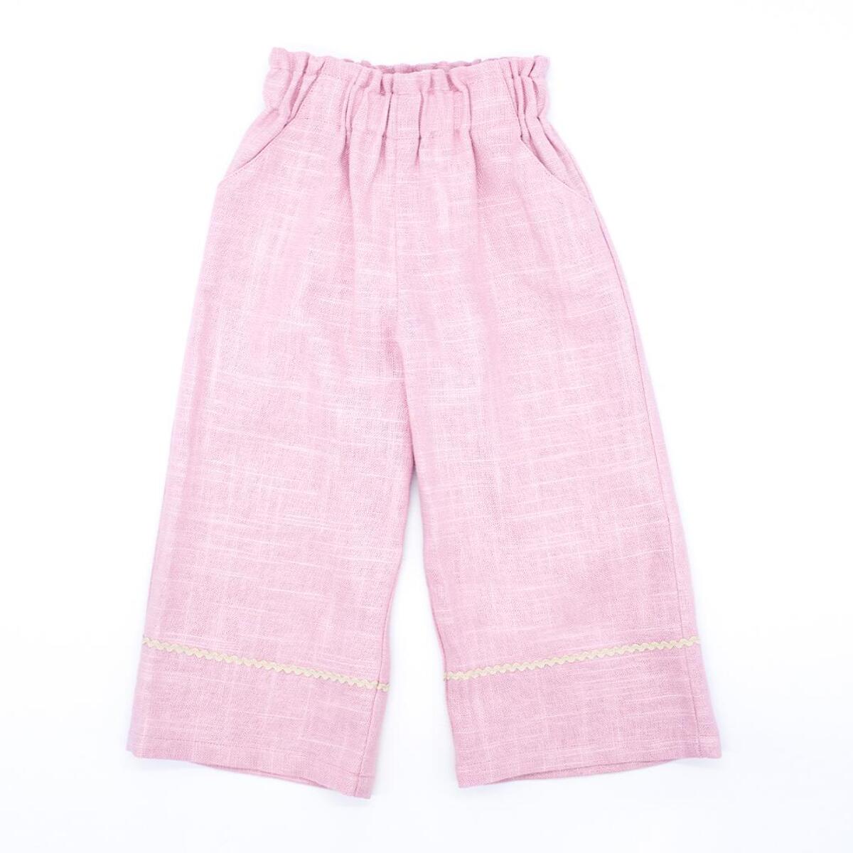 Pantalón largo de lino rosa. Elastico en la cintura, picunela en el bajo.