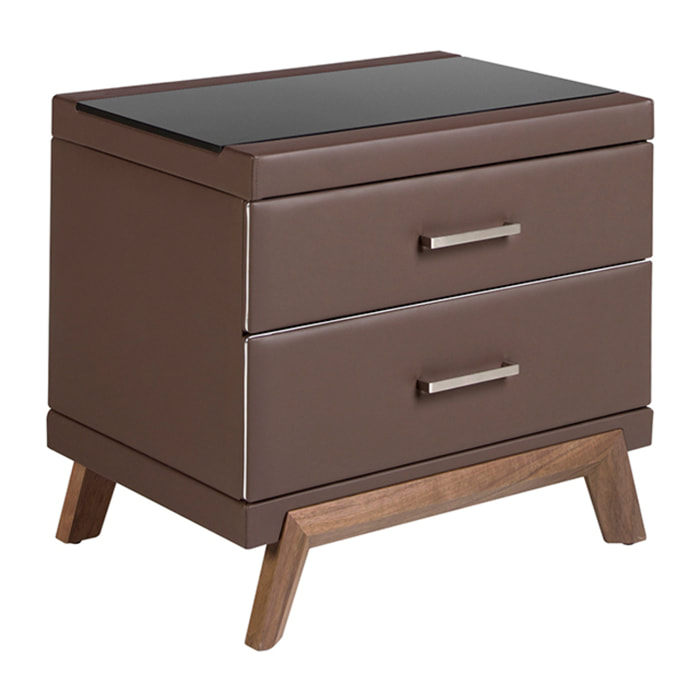 Mesita de noche Angel Cerdá con estructura de madera chapada en nogal natural tapizada en polipiel marrón chocolate y patas de madera chapada en nogal natural tapa de cristal templado tintado en negro 60x46x56cm