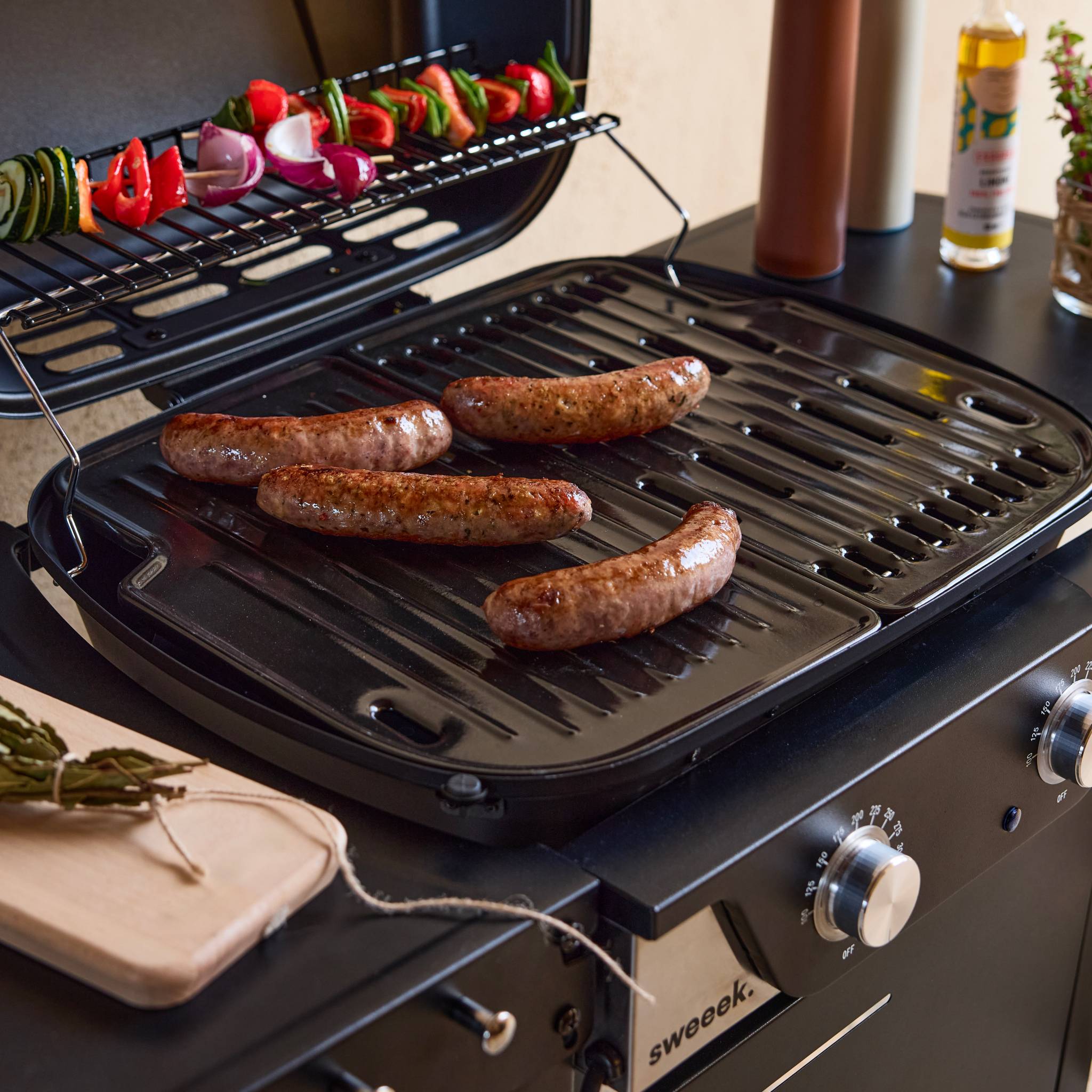 Barbecue électrique noir 2 brûleurs. acier émaillé 2300 W. L 100 x P 61 x H 121.5 cm