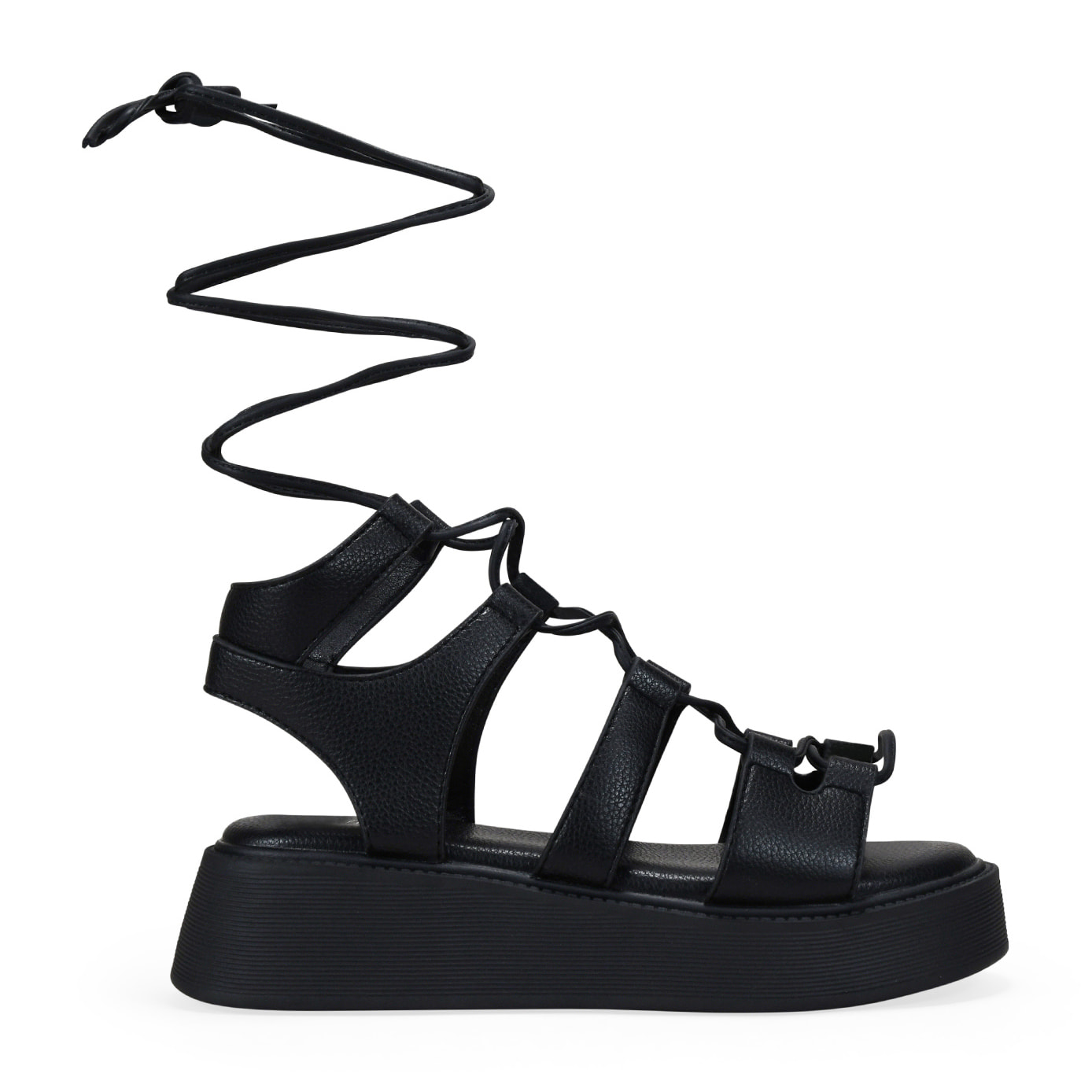 Sandalias negras con tiras atadas