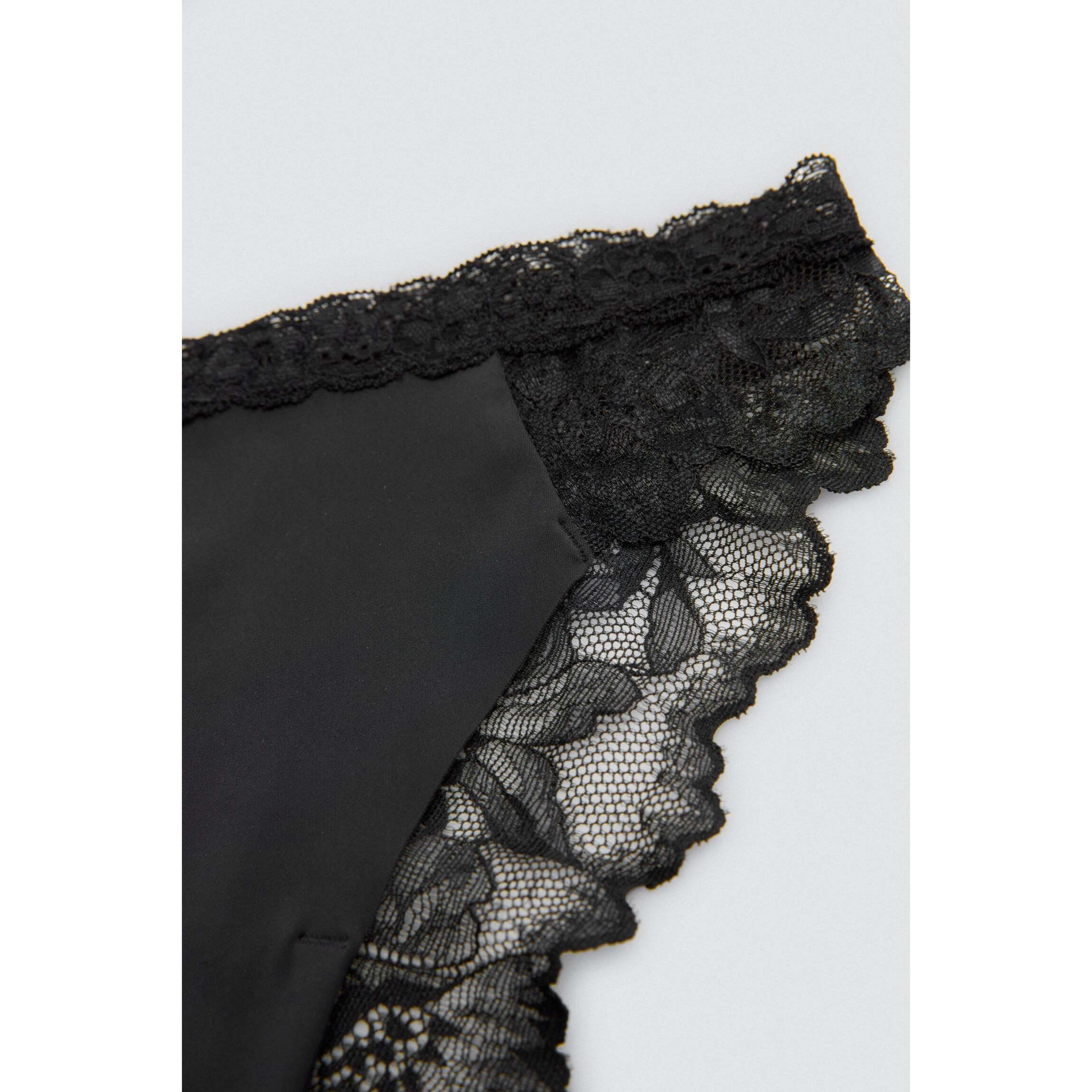Slip brasiliano elastico con pizzo nero