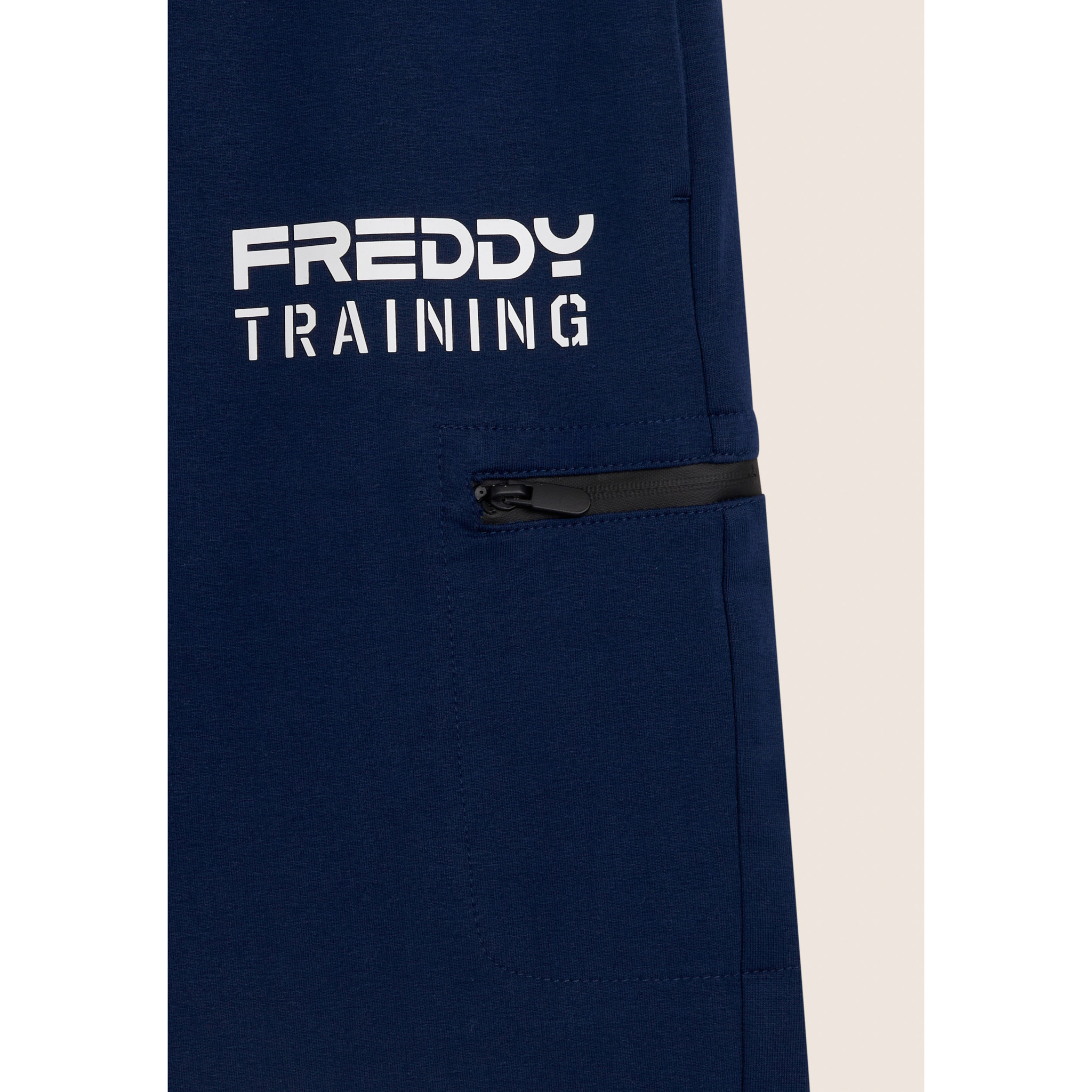 Shorts con stampa "TRAINING" e tasca zip