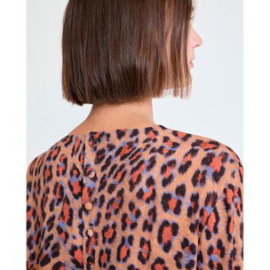 Blusa con stampa animalier e polsini aderenti