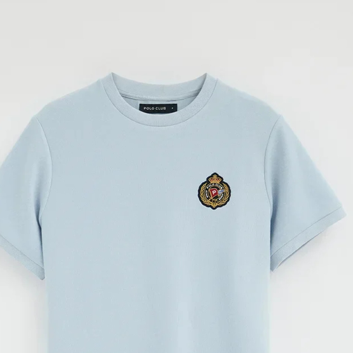 Camiseta azul claro de manga corta con logo náutico Polo Club