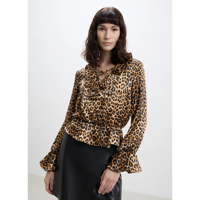 Blusa animalier con rouches