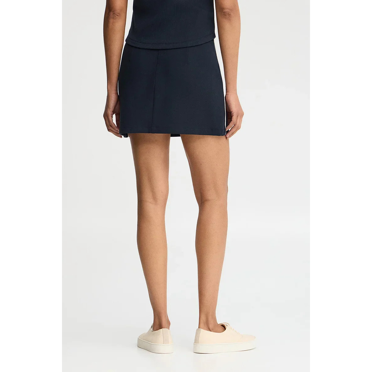 Falda azul marino June con monograma bordado