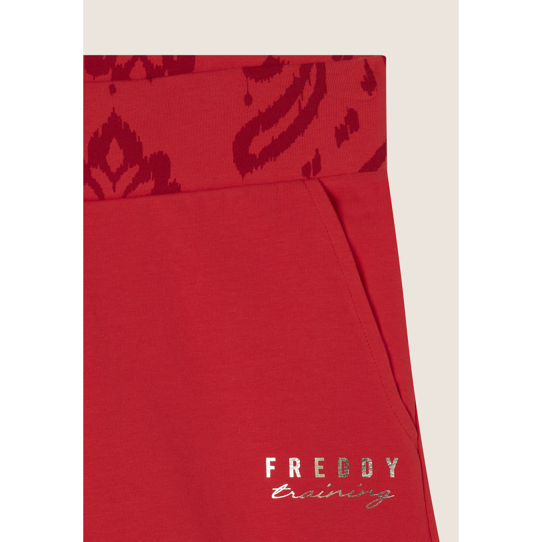 Short sportivi con fascia in vita floreale