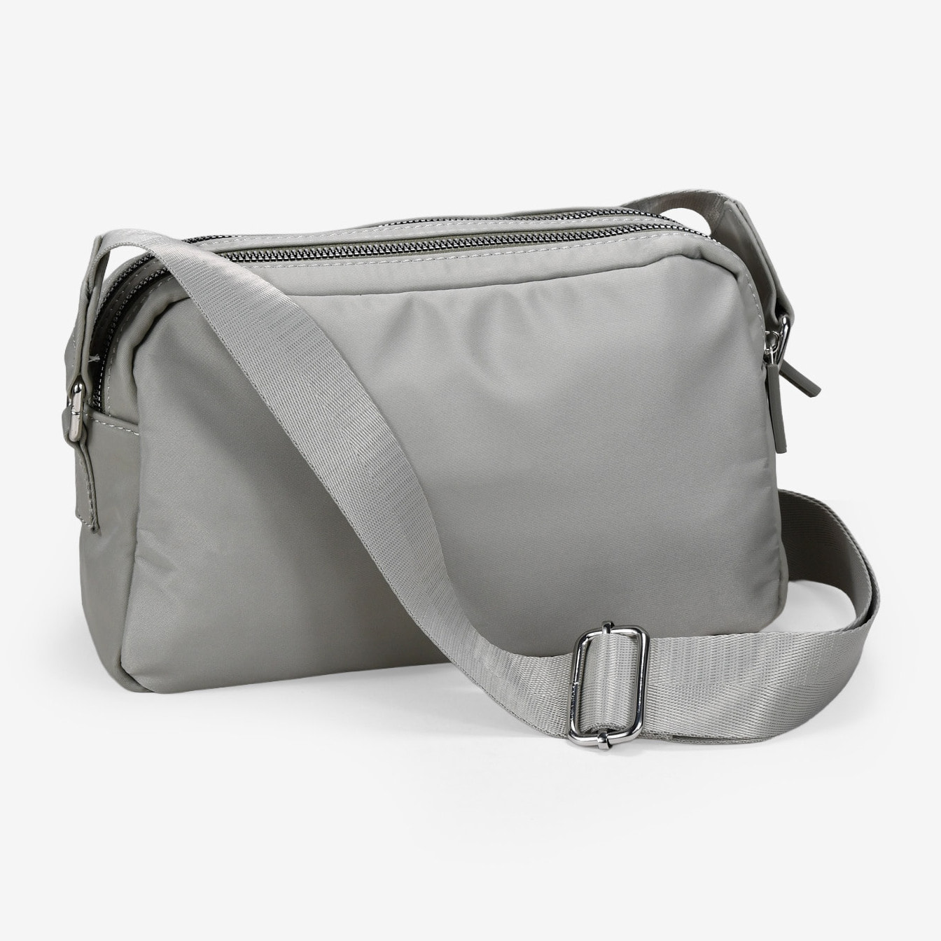 Bolso bandolera verde en nailon con doble cremallera