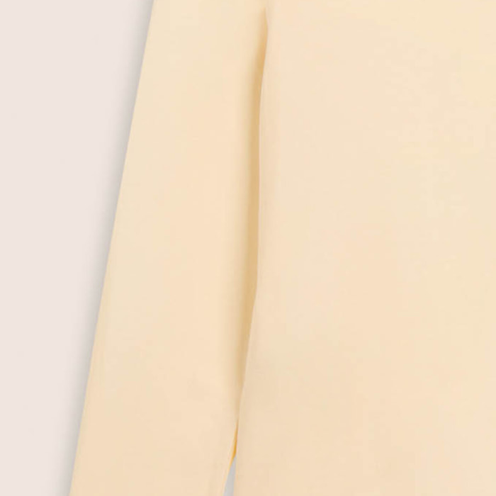 T-shirt da donna a manica lunga con fondo stondato