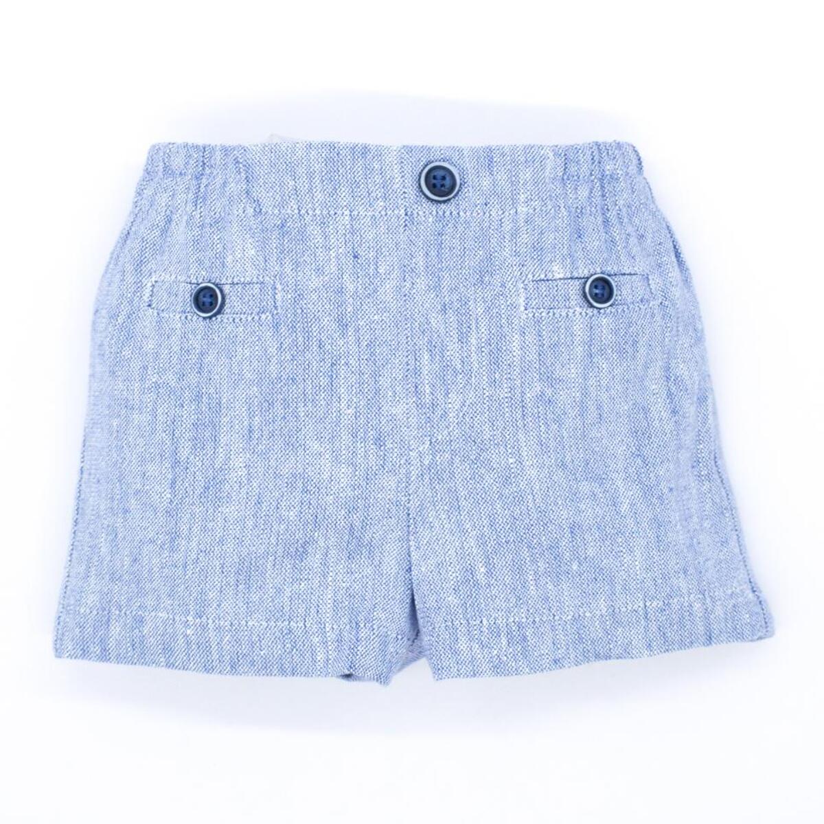 Bermuda de lino rústico azul. Bolsillos falsos y botones, cintura elastica.