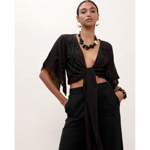 Blusa con nodo e dettagli tonali