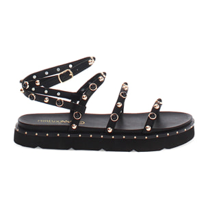 Sandalias planas negras con tachuelas