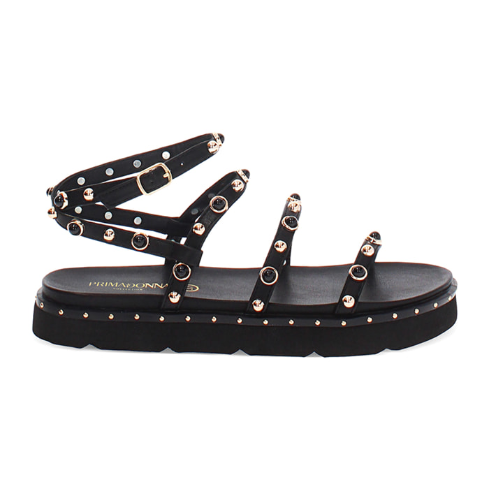 Sandalias planas negras con tachuelas