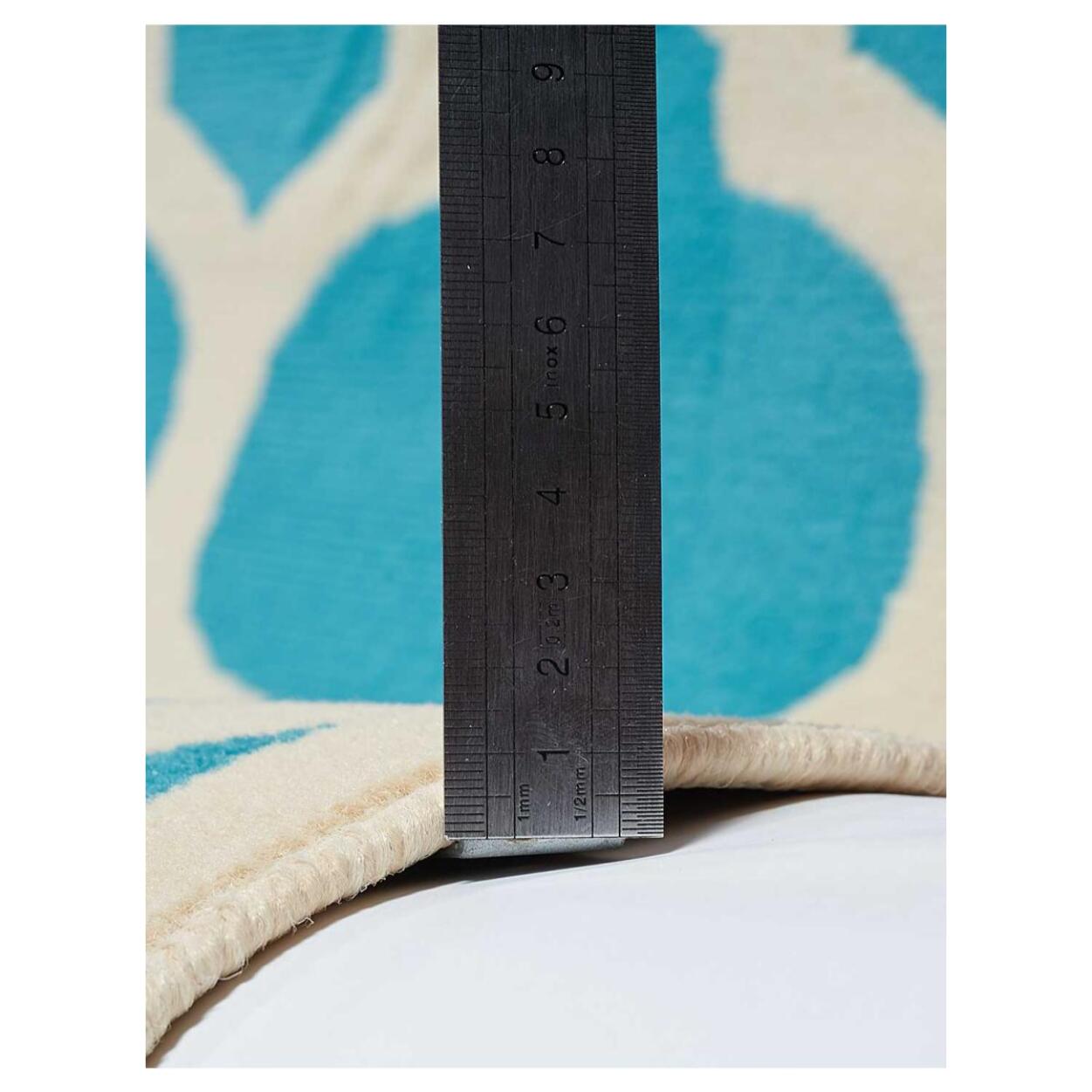 Petit tapis Begja bleu et blanc motif géométrique