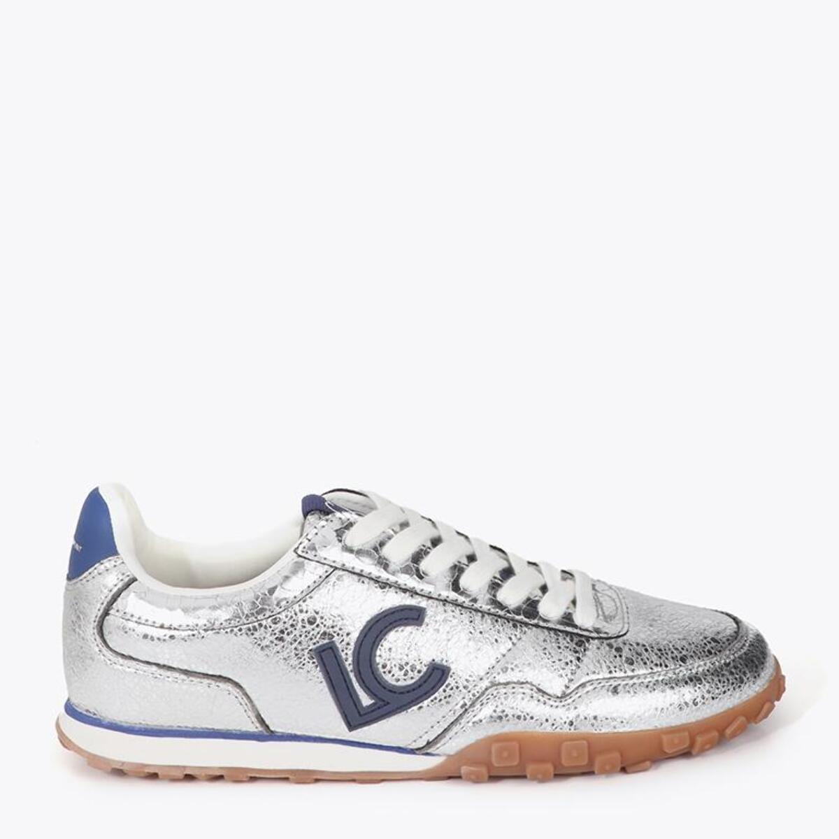 Scarpa sportiva in materiale metallico