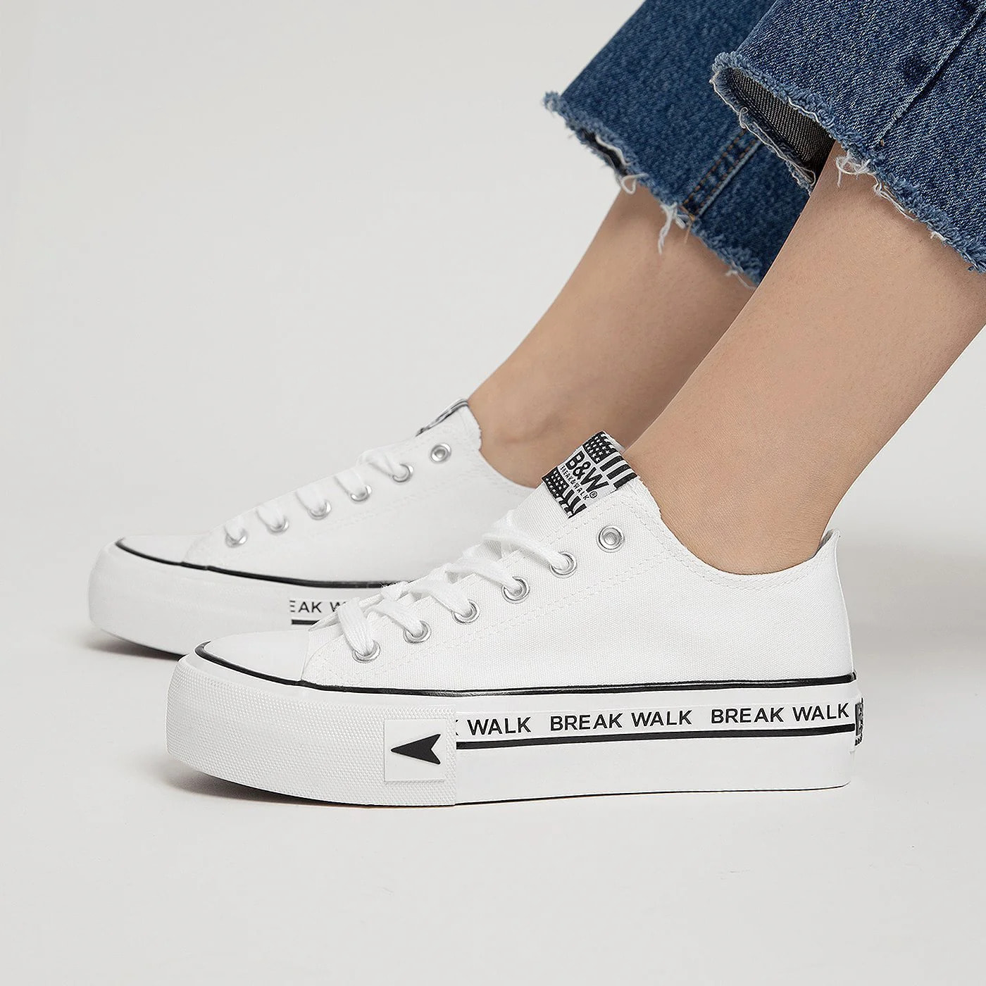 Sneakers con plateau bianche e nere