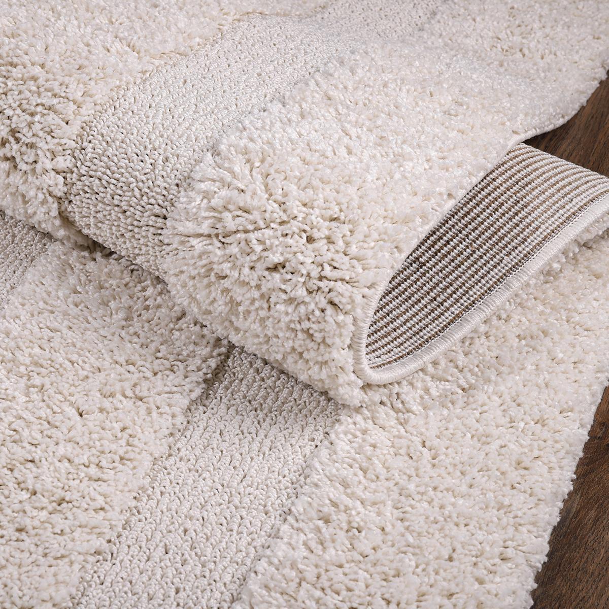 Tapis salon et chambre tissé motif faux uni KUNE