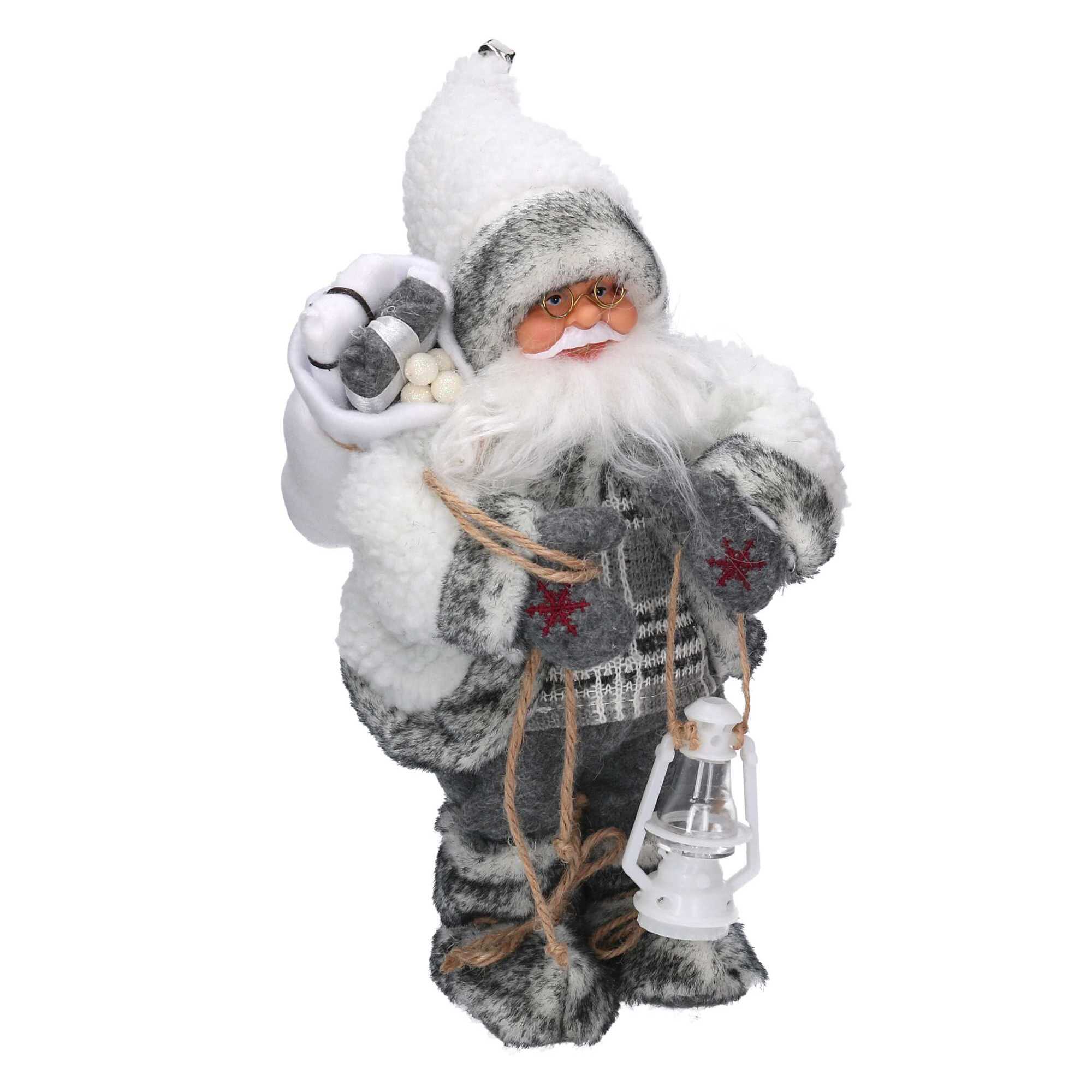 Babbo natale in tessuto con musica e movimento bianco cm19x9h30