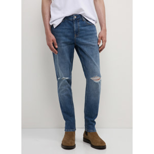 Jeans skinny con strappi