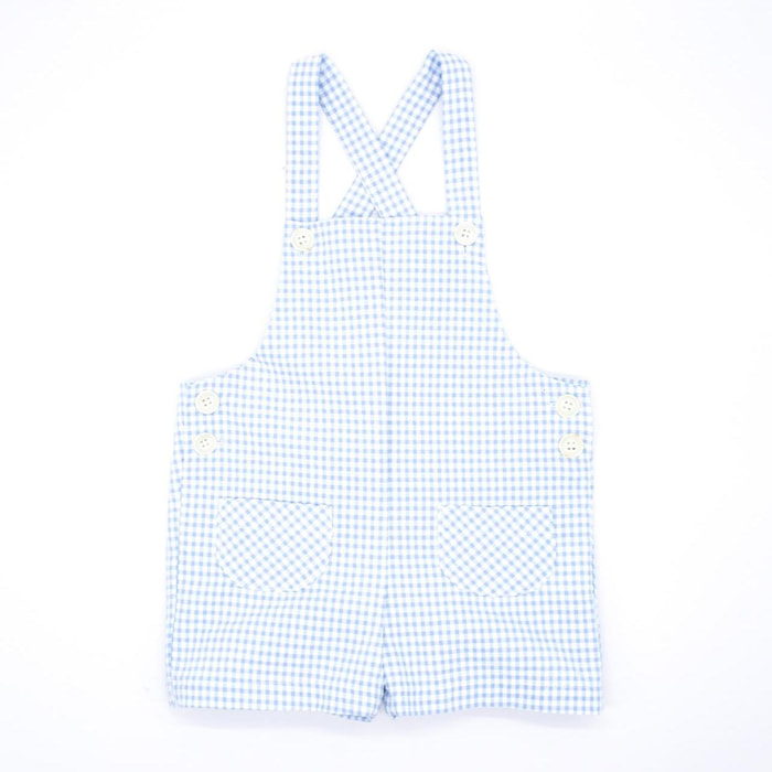 peto vichy azul, con bolsillos y tirantes cruzados.