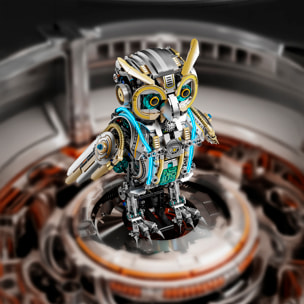 Maqueta 3D mecanizada de buho con 1296 piezas, equipada con luces y mecanismo de manivela que permite movimiento dinámico.
