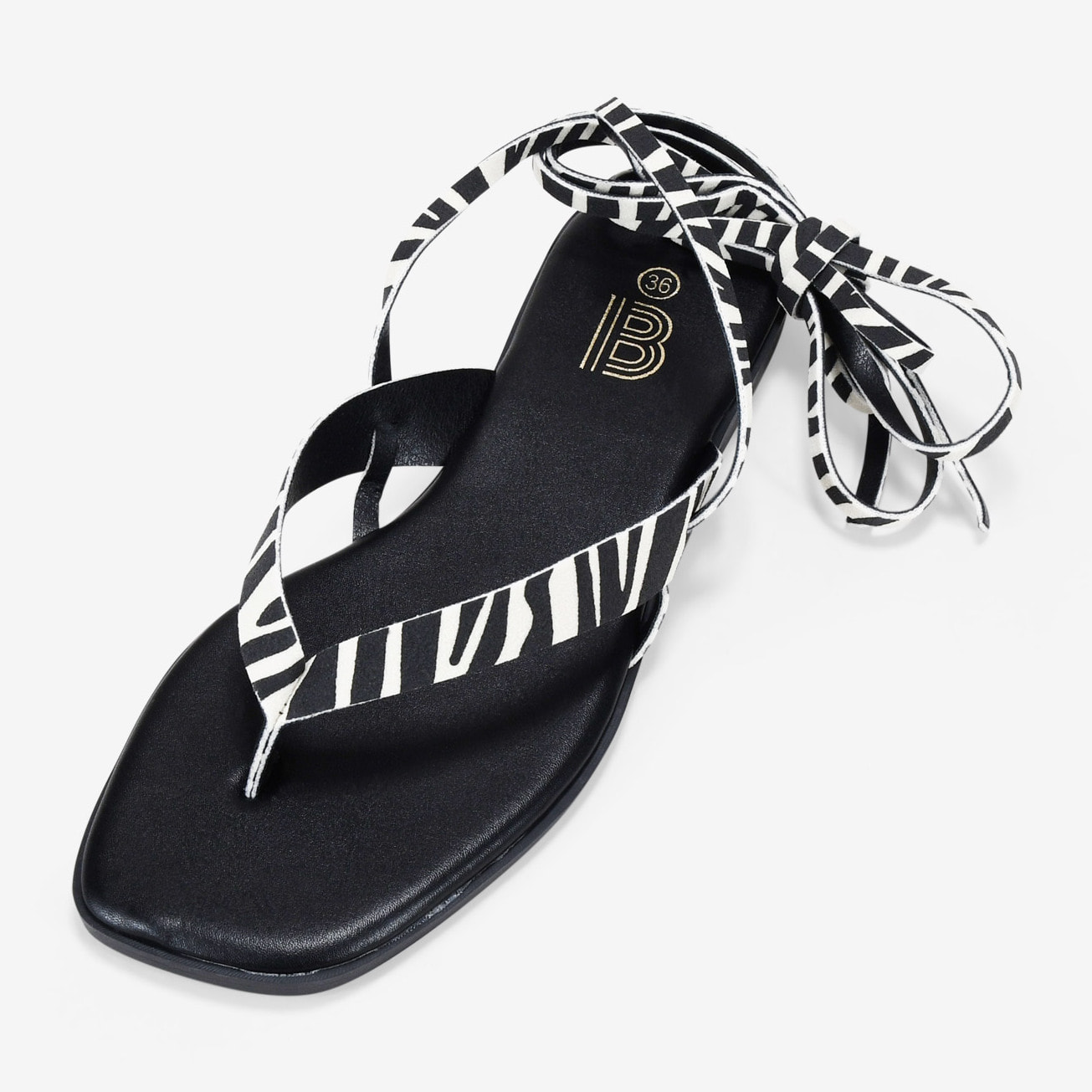 Sandalias de dedo efecto cebra con tiras atadas