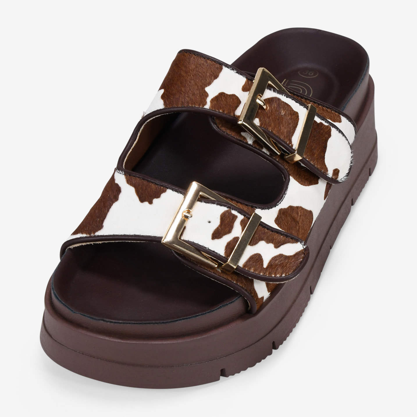 Sandalias de plataforma con pelo print vaca