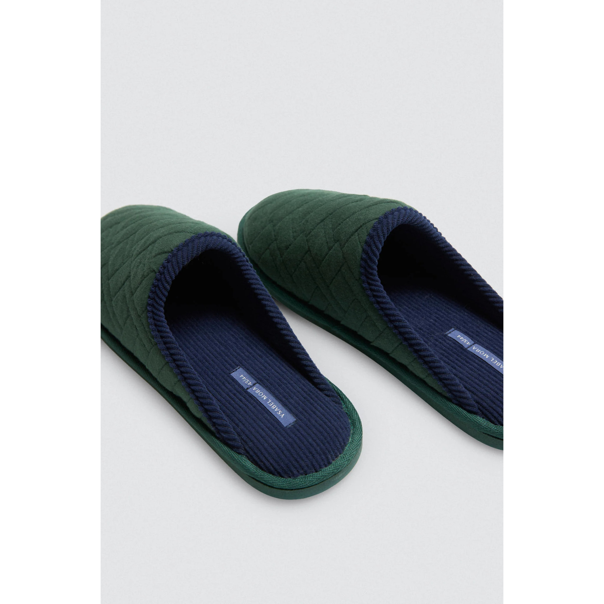 Pantofole in pelliccia con stampa etnica