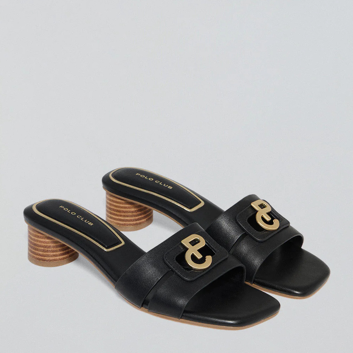 Mules con tacco alto Giorgia nere con dettagli metallici