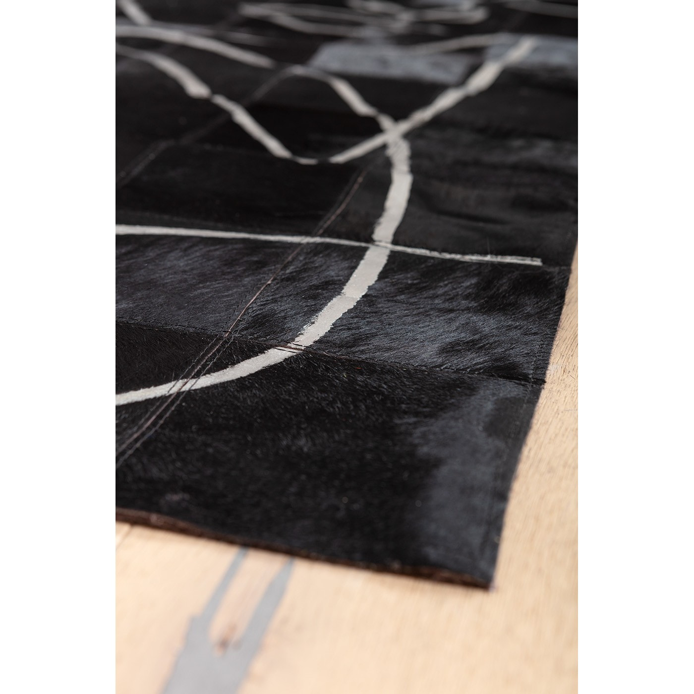 Tapis visages noir Kare Design