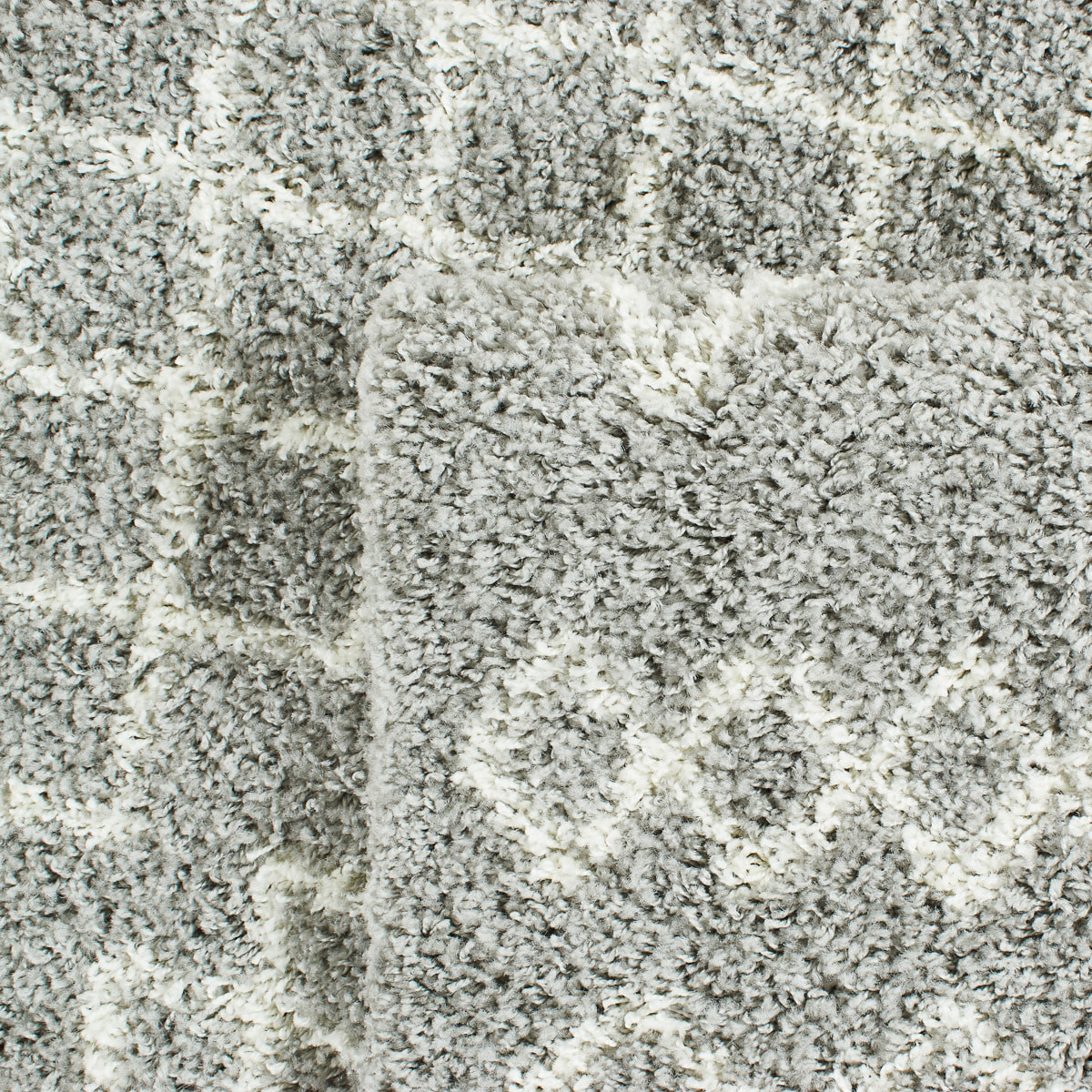 Asma - tapis shaggy de salon en laine artificielle style berbère gris et blanc - 150x220cm