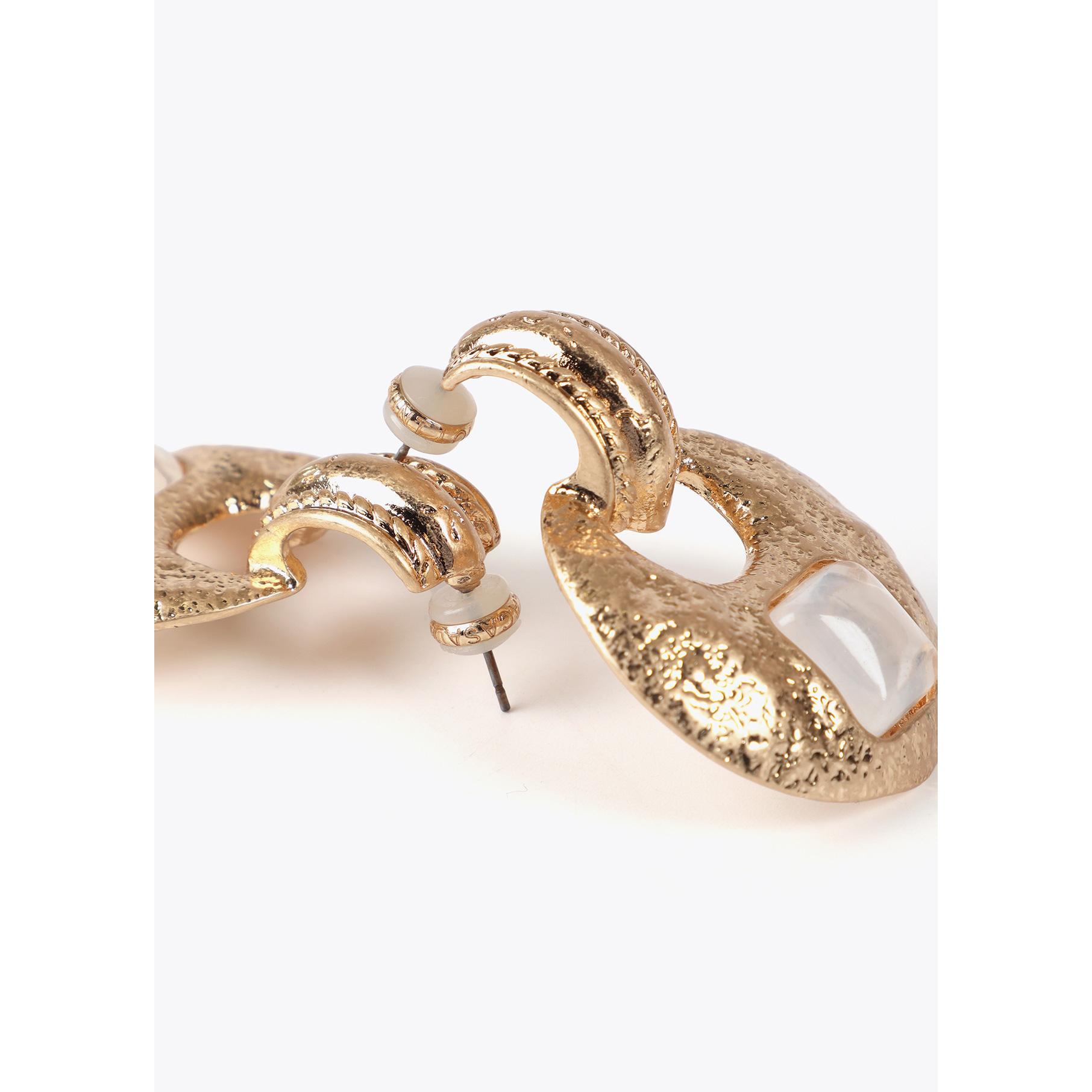 Orecchini incastonati in metallo martellato