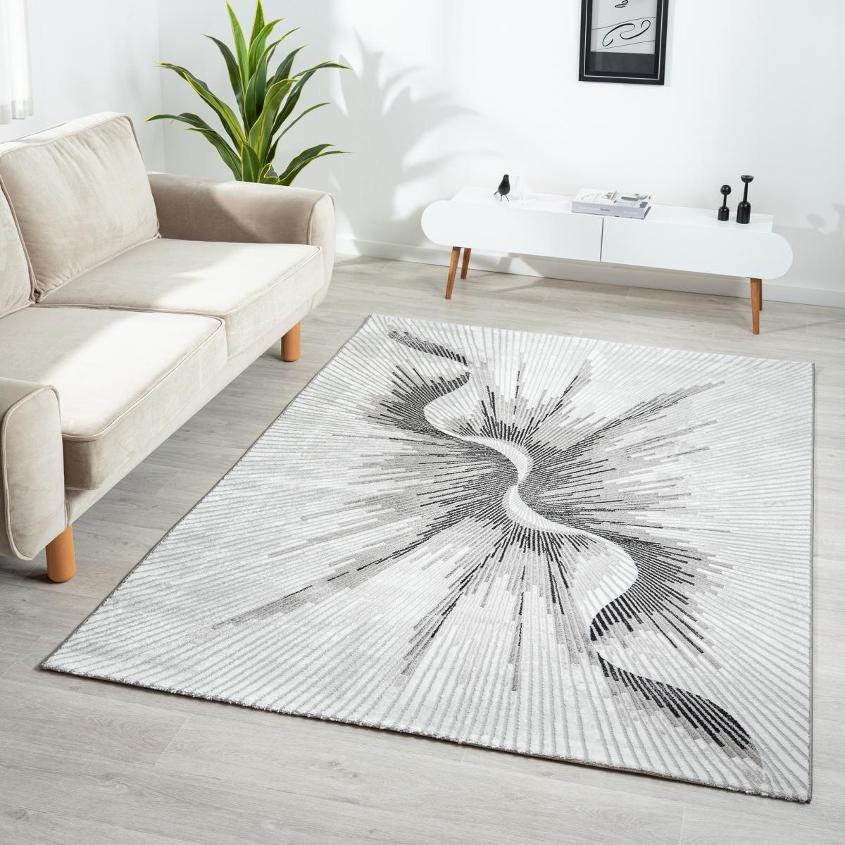 Tapis moderne Kaci aux motifs abstraits de couleur grise