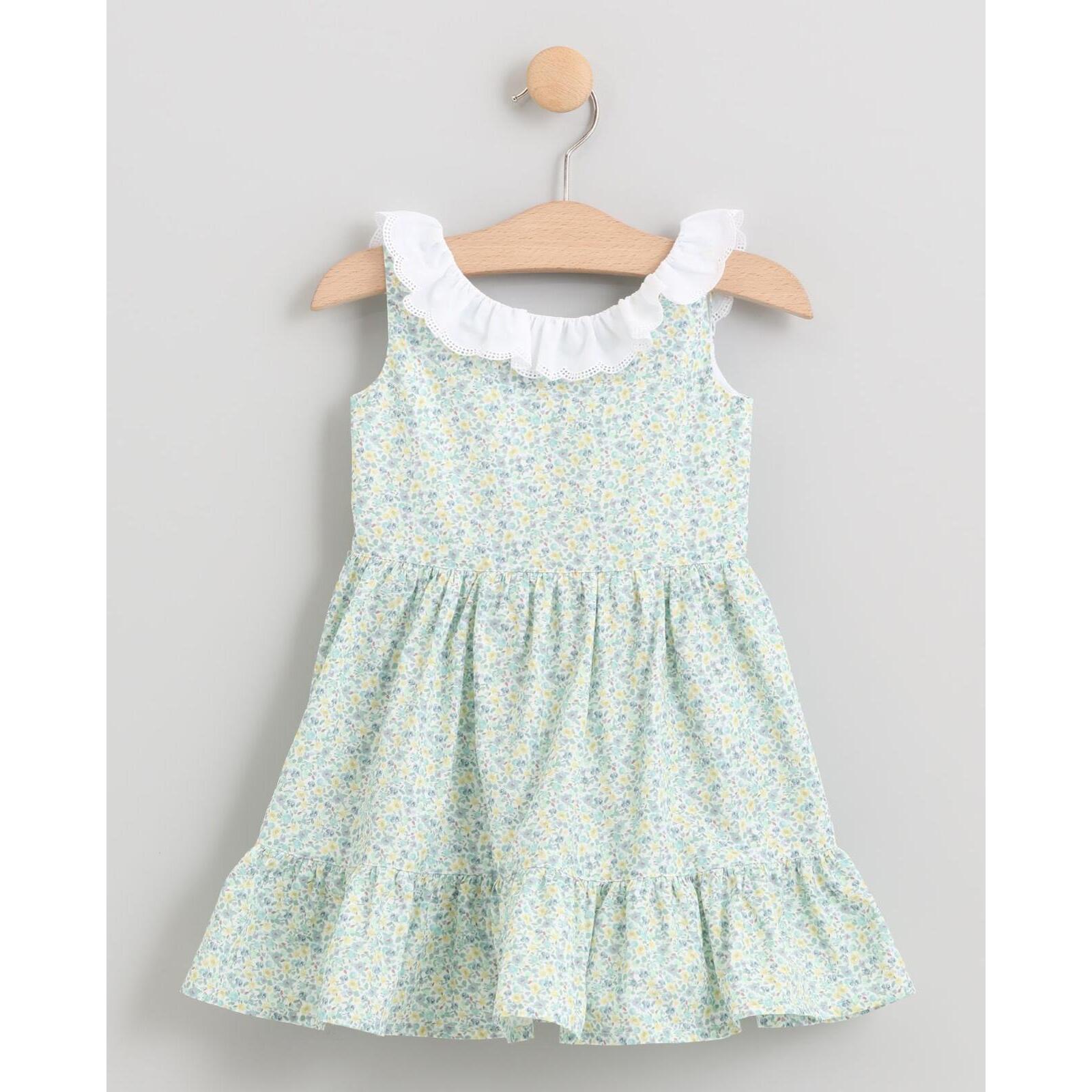 VESTIDO DE FLORES AZULESCON VOLANTE EN ESCOTE BORDADO