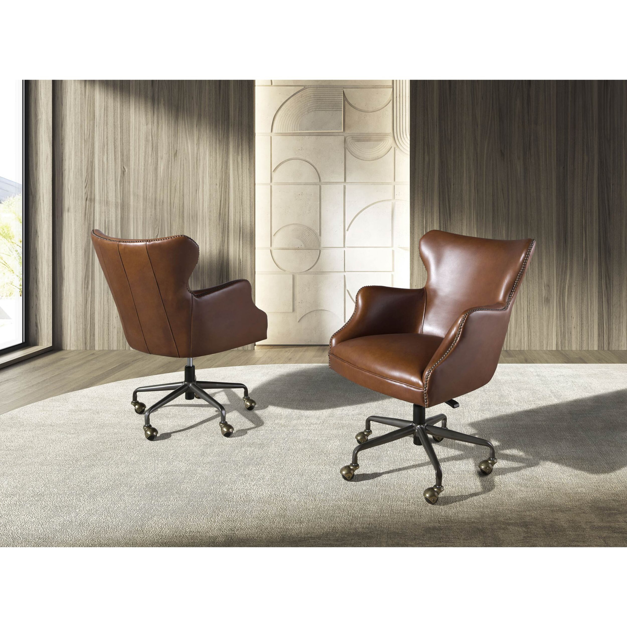 Sillón giratorio con asiento y respaldo tapizado en piel de origen vacuno en marrón oscuro patas en acero inoxidable oscurecido 64x74x90cm