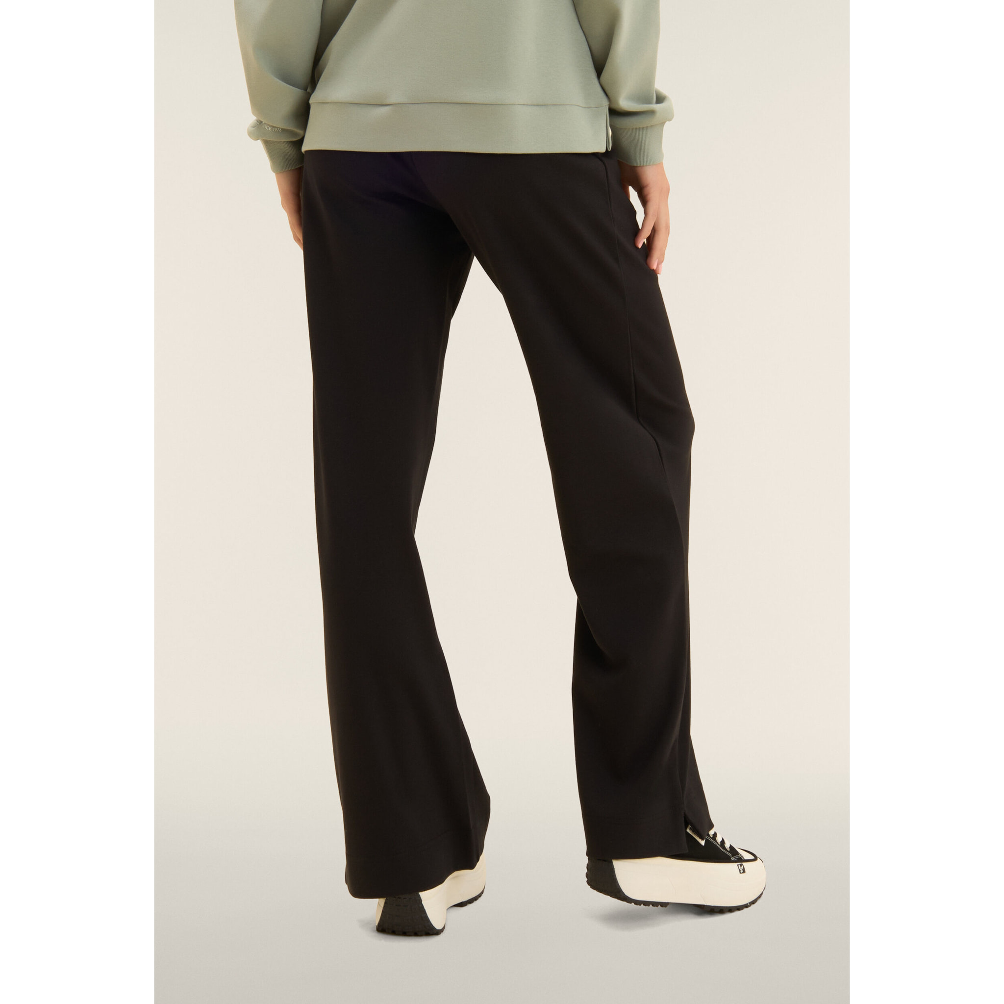 Tuta con zip e collo alto, pantaloni wide leg