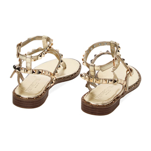 Sandalias planas doradas en laminado