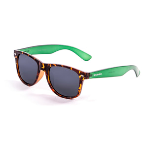 Occhiali da sole OCEAN BEACH WAYFARER - Frente carey e / Ahumada verde mate en el brazo