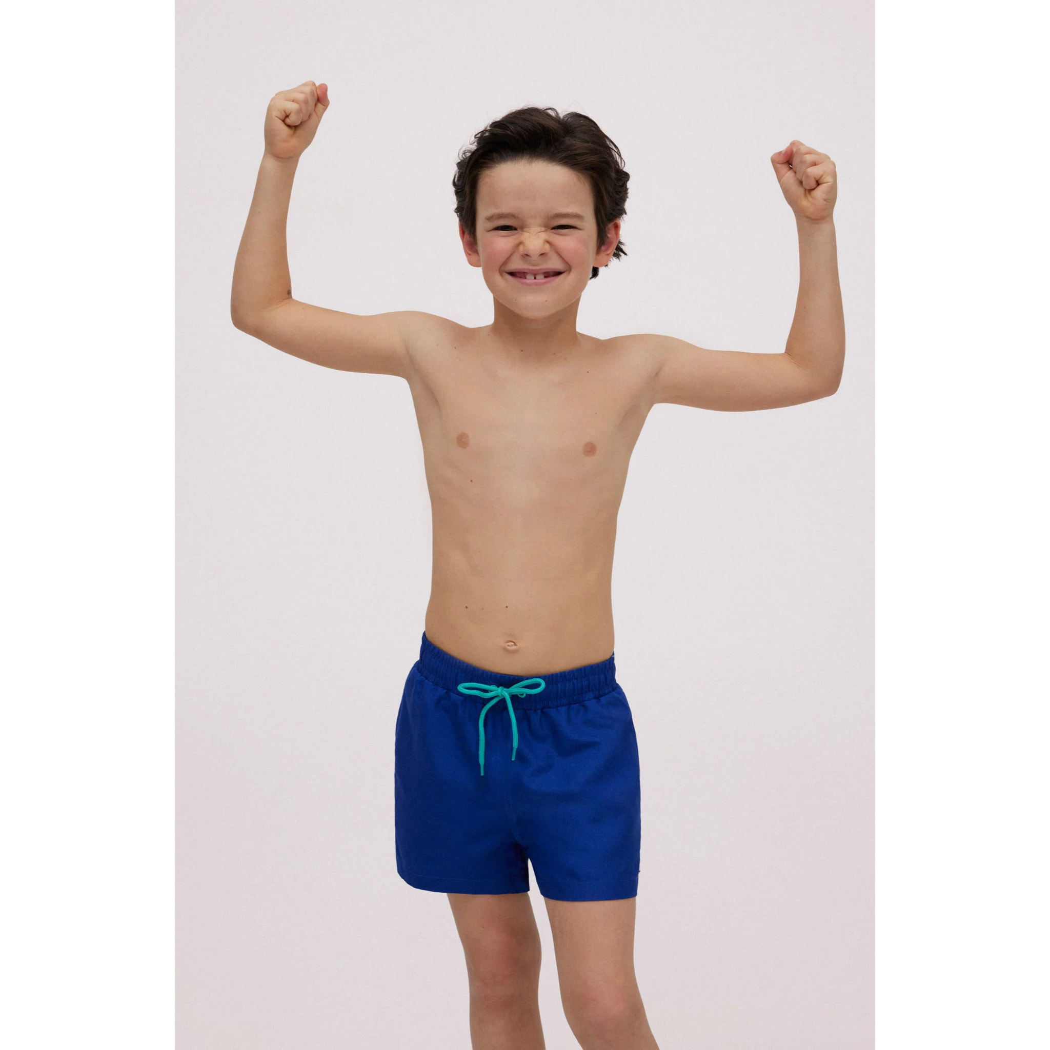 Costume da bagno corto da ragazzo blu scuro in tinta unita