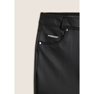 Pantaloni skinny in similpelle con logo ricamato