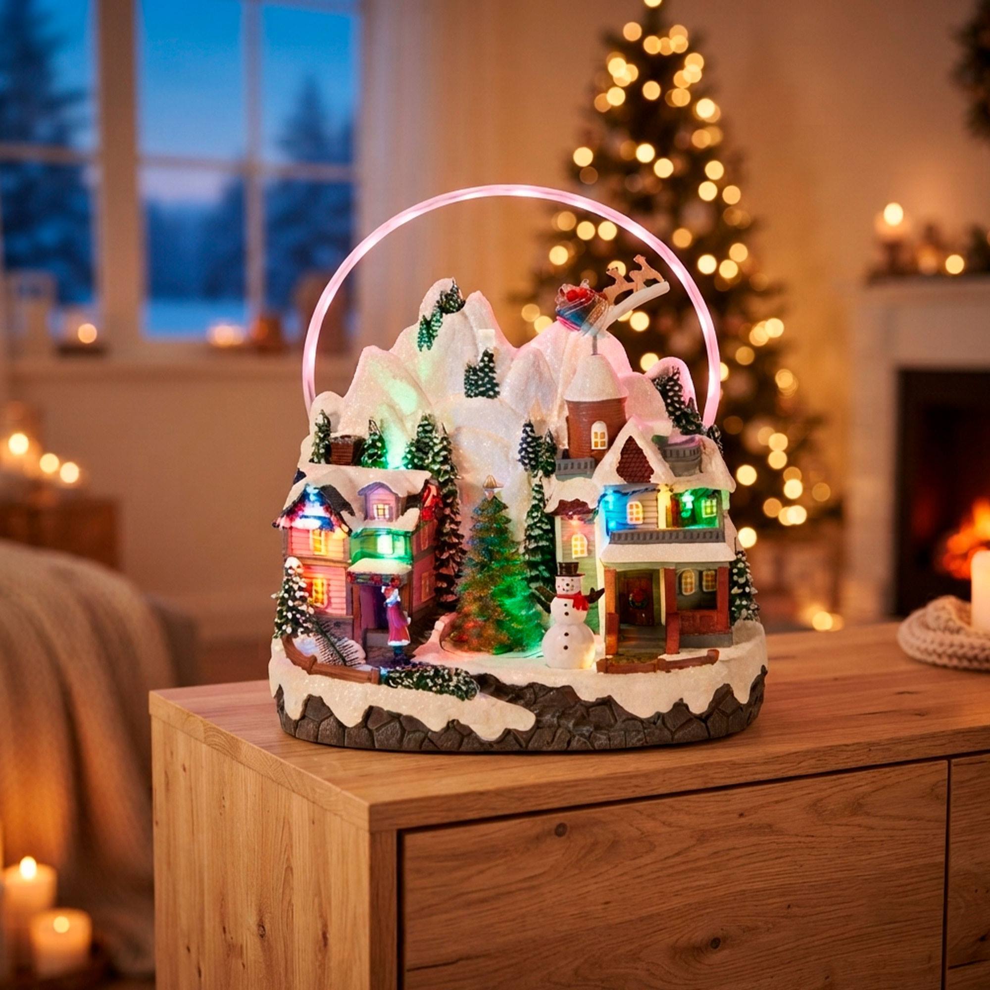Pueblo navideño led con movimiento, escena de invierno bajo arco iris 27x17,9x30cm
