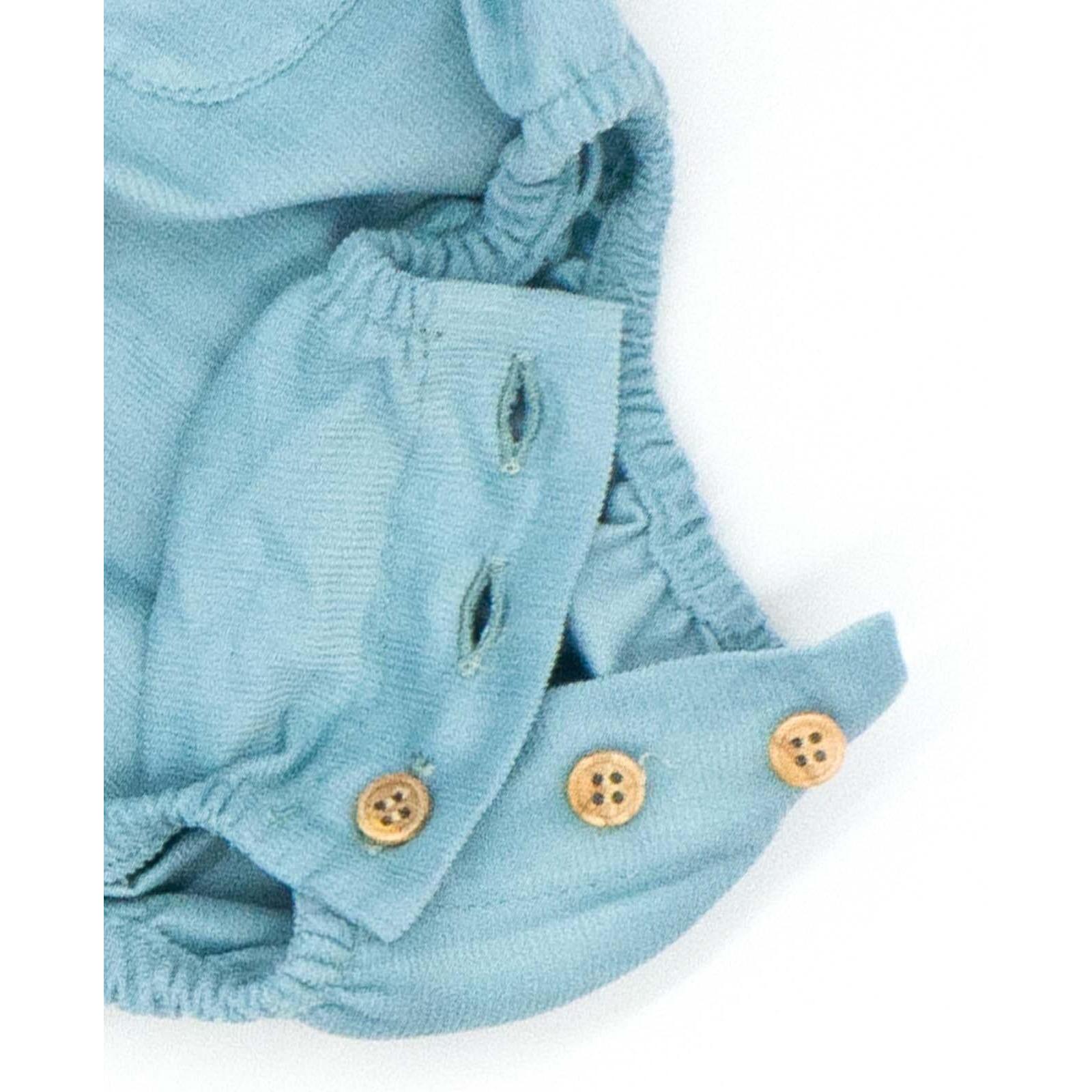 Peto con gomitas y botones pana azul