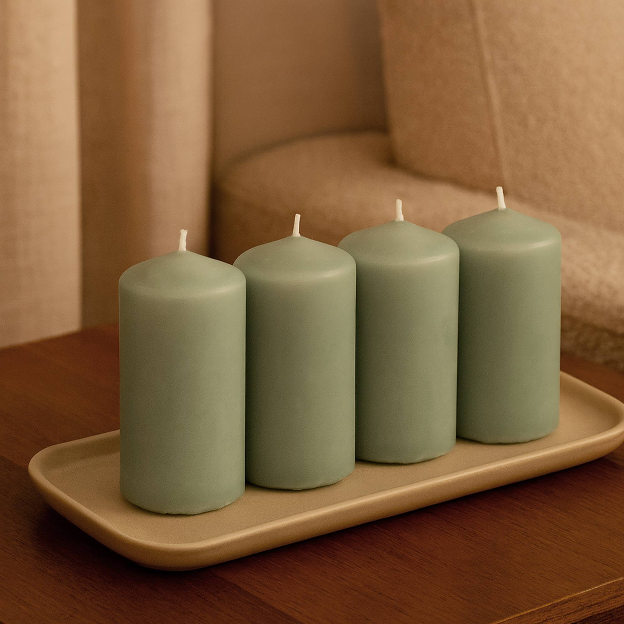 Set de 4 velas de cera en color menta ø5x10cm y 25h de combustión