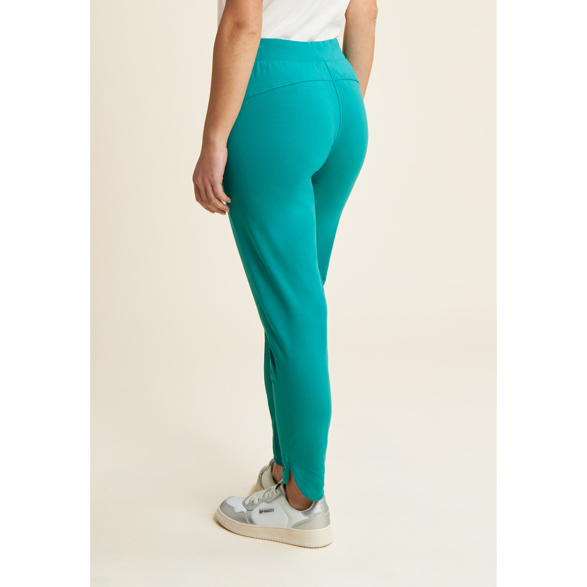 Pantaloni slim fit in jersey con dettagli floreali