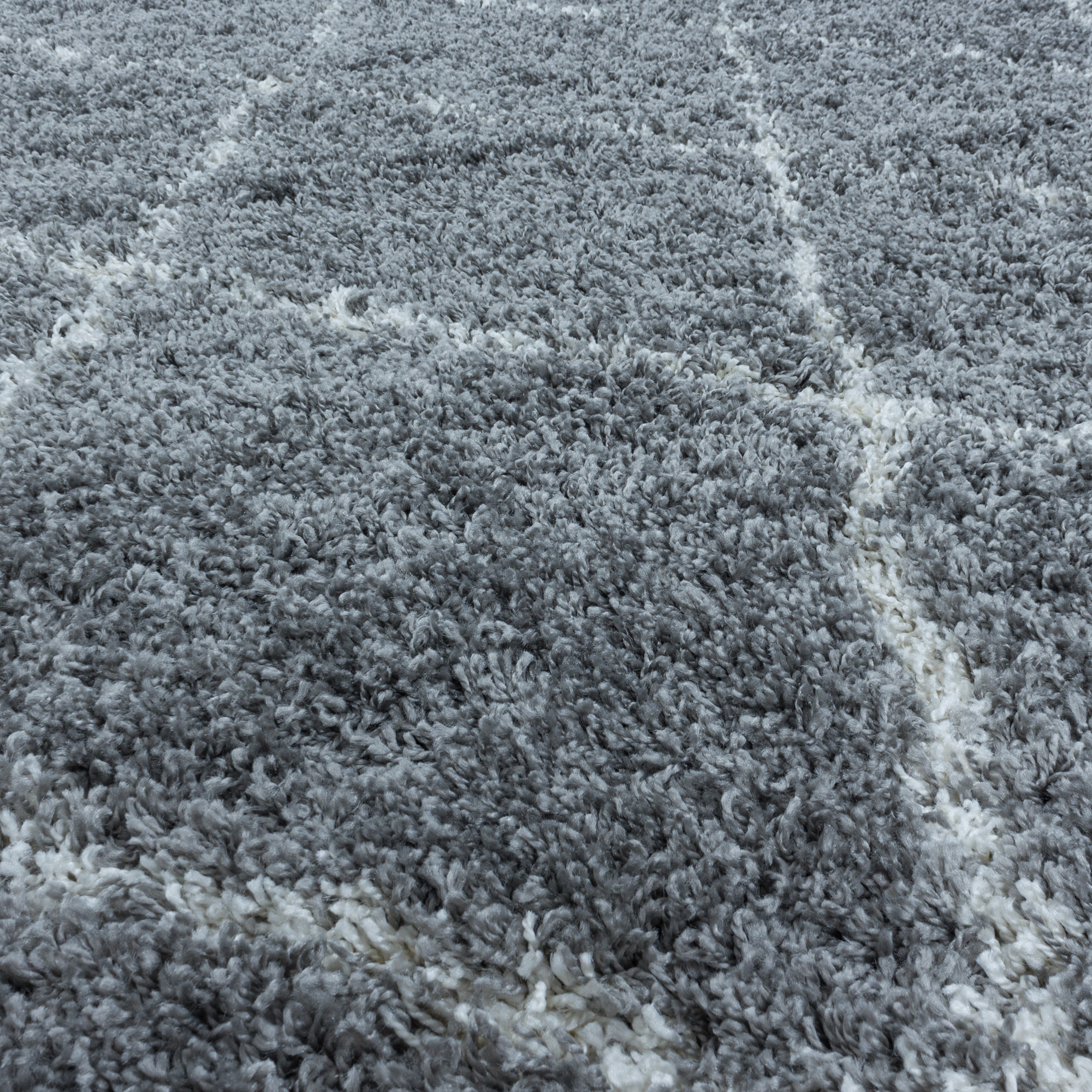ALVOR - Tapis shaggy rond à poils longs motif berbère gris