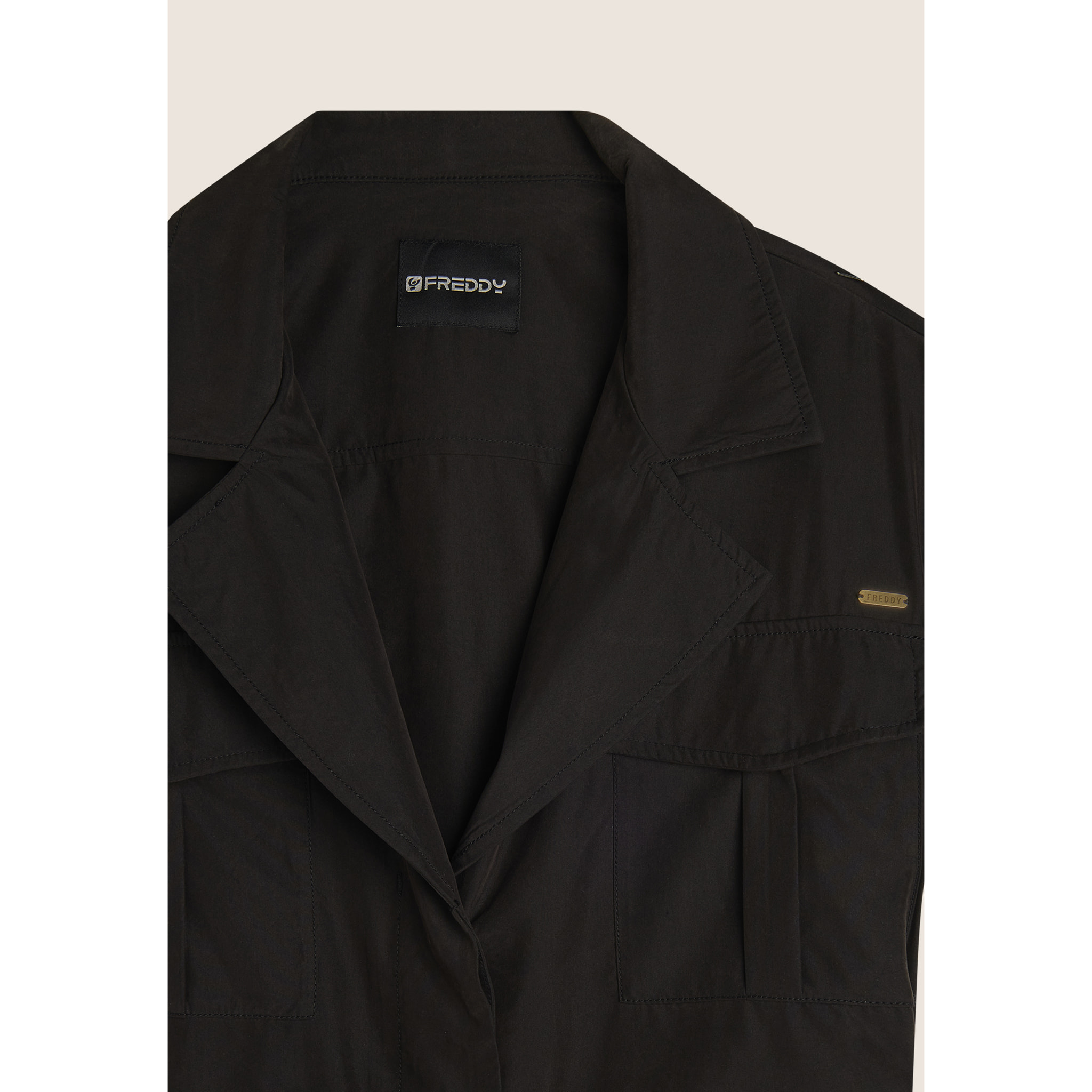 Trench donna senza maniche con cintura in vita